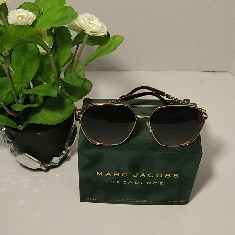 Jessica Simpson sunglasses